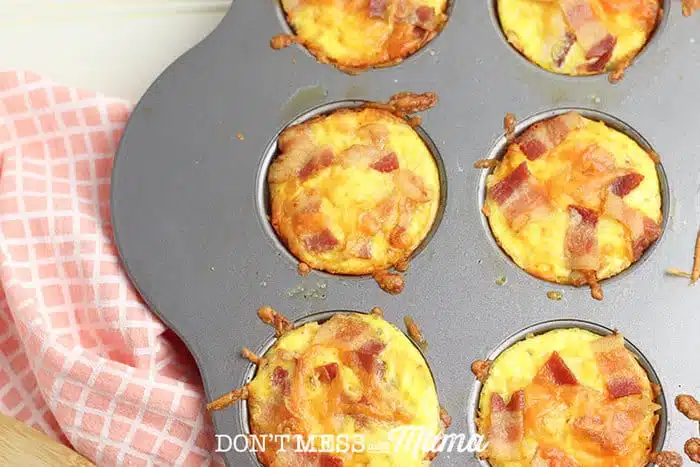 fully cooked mini egg quiches in a muffin tin