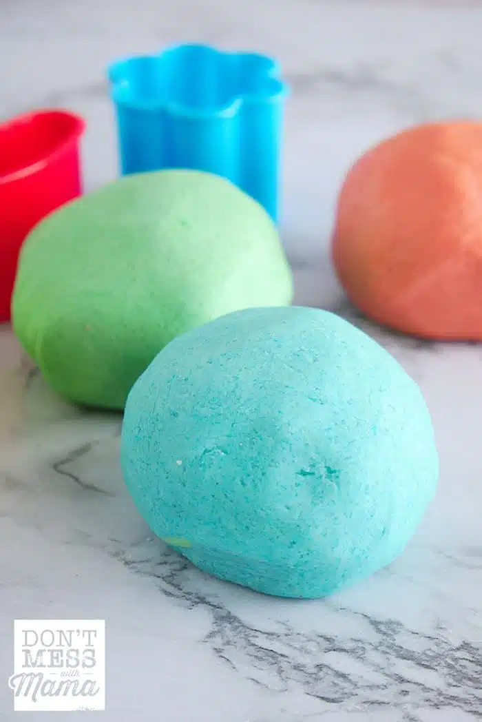 Playdough balls in different colors on a table