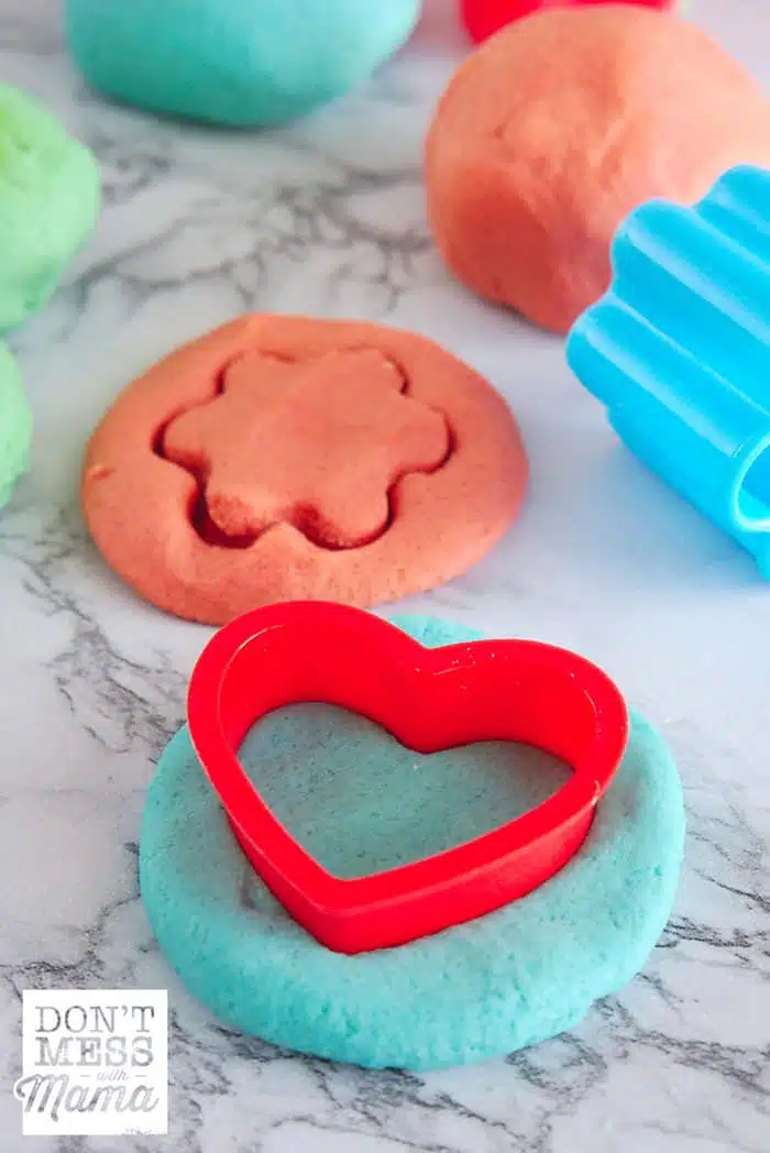 DIY Play Dough on a table with cookie cutters