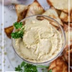Roasted Garlic Hummus Recipe - Make homemade hummus without the canned garbanzo beans. It's so easy and so much better for your digestive system - DontMesswithMama.com