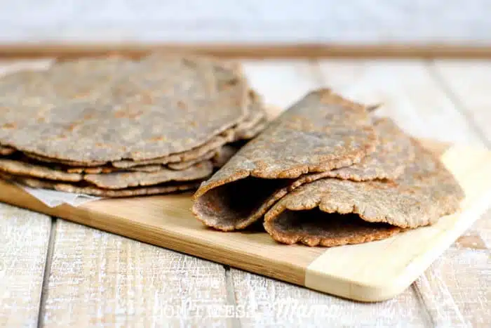 closeup shot of gluten-free flour tortillas on a wooden board