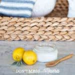 DIY Homemade Soft Scrub Cleaner on table with lemons