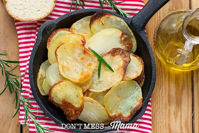Closeup of potato chips in a cast iron skillet