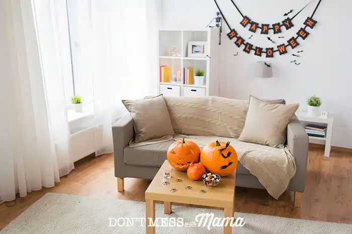 Photo of living room with carved pumpkins