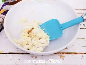 Gluten-Free Cheese Cracker dough in bowl with spatula