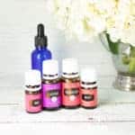 DIY Facial Serum on table with bottles of essential oil