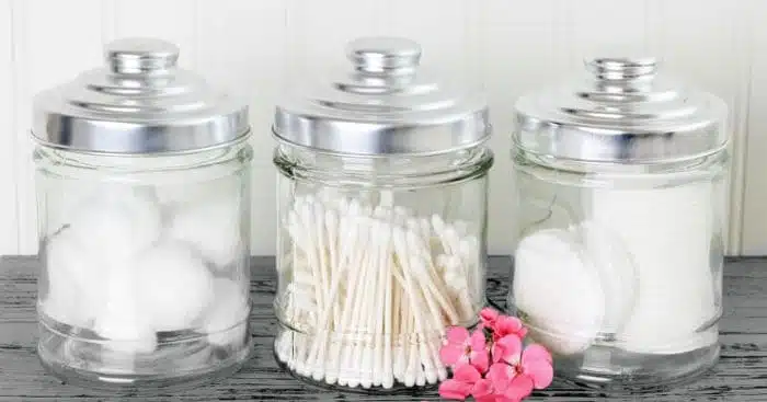 cotton balls and q tips in jars