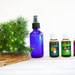 DIY Natural Aftershave in a blue bottle with essential oils