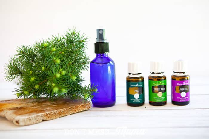 DIY Natural Aftershave in a blue bottle with essential oils