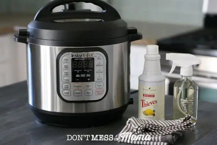 Instant Pot next to Thieves Household Cleaner on a table