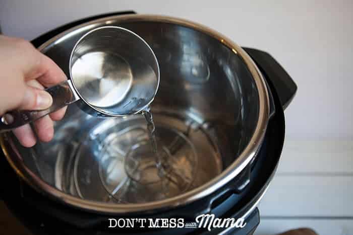 Closeup of water added to an Instant Pot inner pot