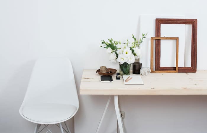 10 Steps to Declutter Your Home - white chair next to a white table