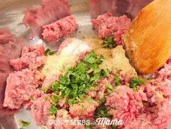 ground beef and seasoning in a pan