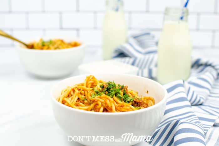 Gluten-Free Instant Pot Spaghetti in two blue bowls