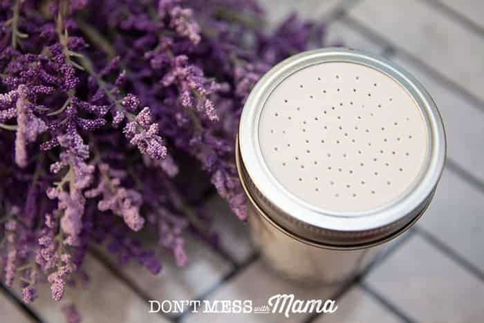 Closeup of DIY shoe powder with a bunch of fresh lavender