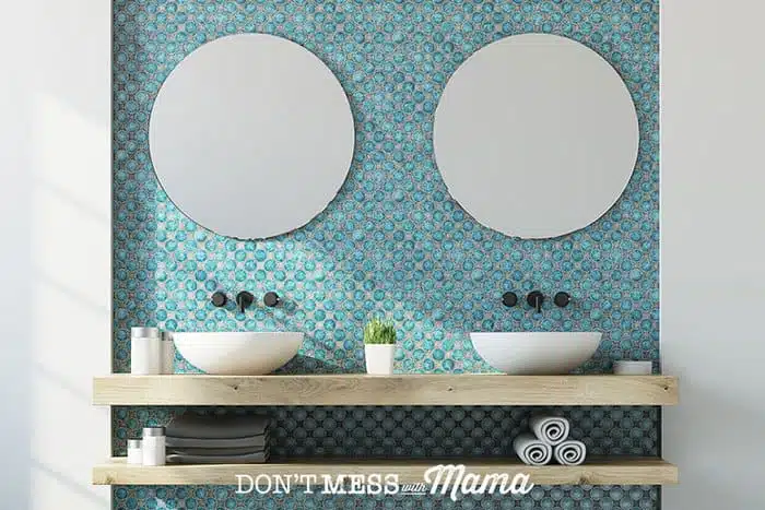 Photo of bathroom with two mirrors and two sinks