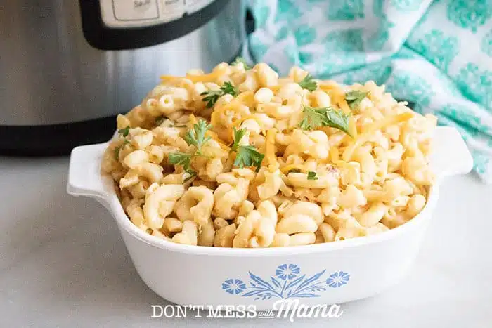 a bowl of gluten-free mac and cheese with an Instant Pot in the background