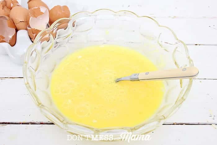 Closeup of beaten eggs in a bowl