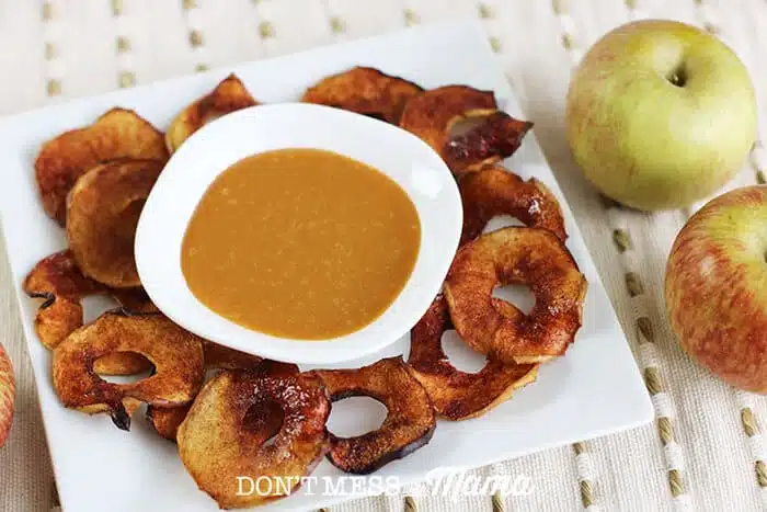 Air Fryer Apple Chips on a plate with dip