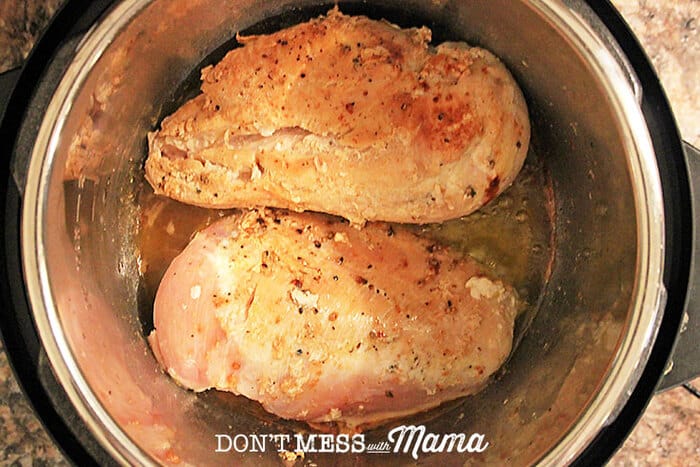 Browned chicken breasts in the Instant Pot