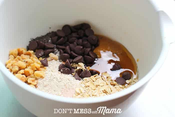 Ingredients to make Peanut Butter Protein Bites in a white bowl