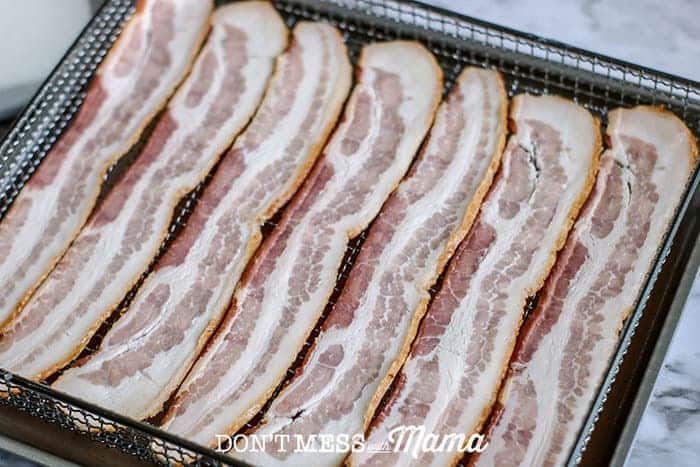 Bacon in the air fryer tray before cooking
