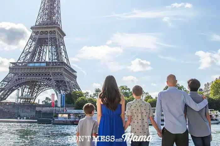Family looking at the Eiffel Tower in Paris, France