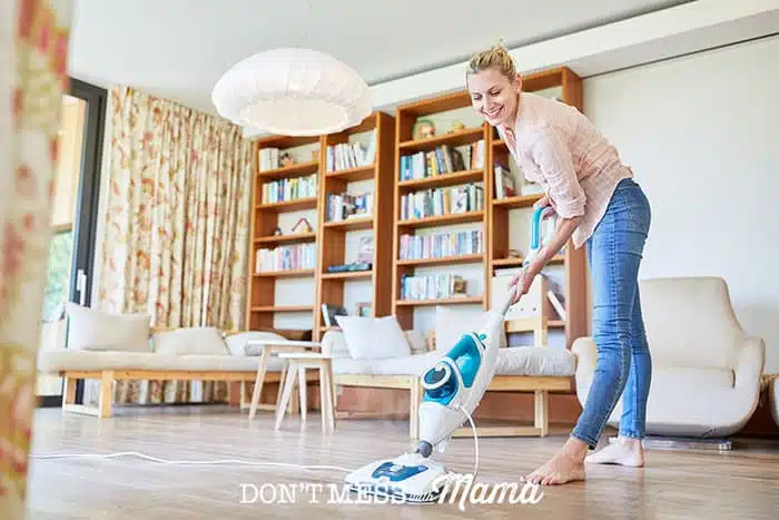 Woman using an electric mop to clean the floor