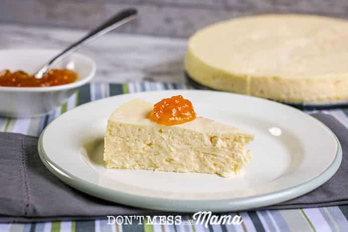 low carb Cheesecake on a plate with fruit preserves
