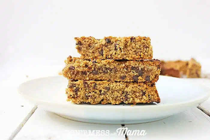 peanut butter protein granola bars stacked on a white plate