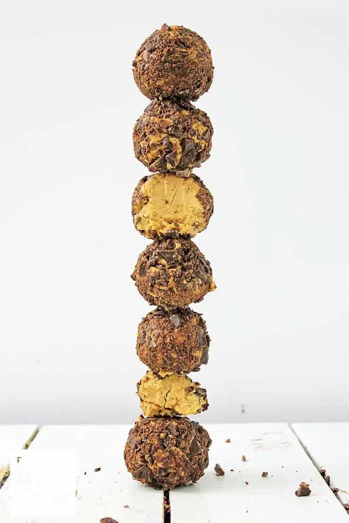 chocolate peanut butter balls stacked on each other
