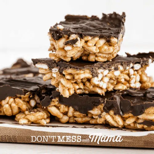 stack of ouffed rice bars with chocolate on a plate
