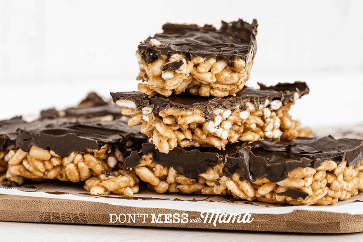 stack of ouffed rice bars with chocolate on a plate