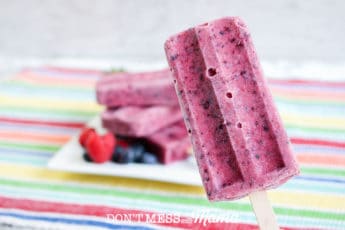 mixed berry popsicle with striped table cloth