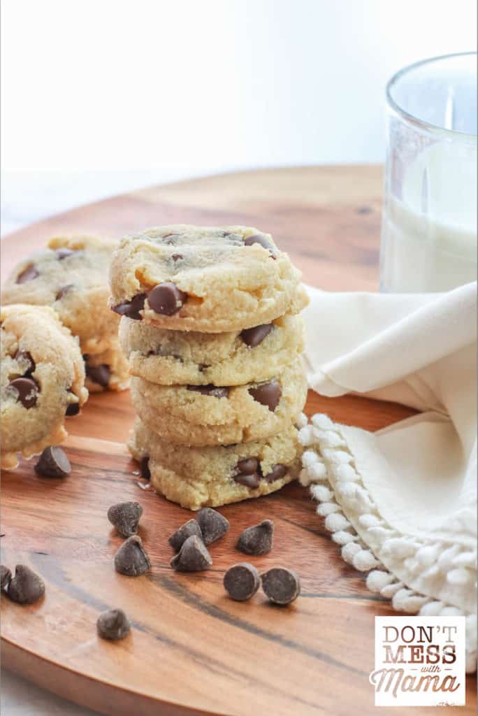 stack of chocolate chip cookies with milk