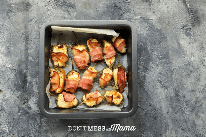 baking tray with baked jalapeno poppers