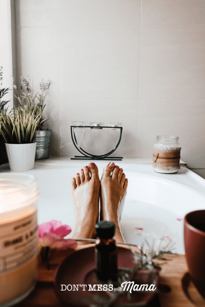 feet in bath with essential oils