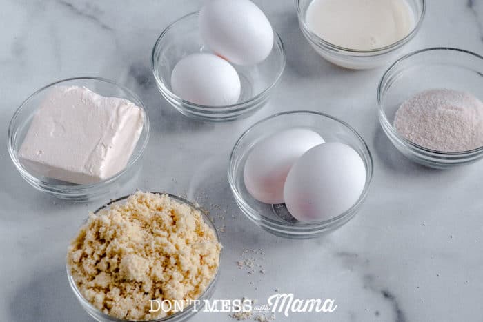 eggs, almond flour and heavy cream in small glass bowls