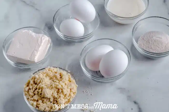 eggs, almond flour and heavy cream in small glass bowls