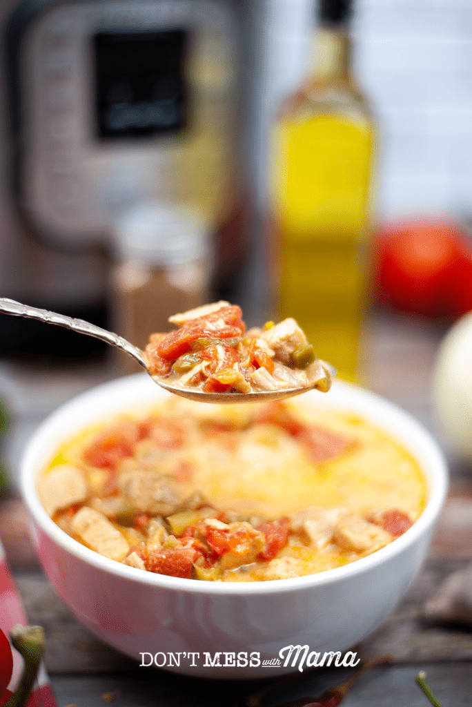 spoonful of fajita soup with bowl and instant pot in background