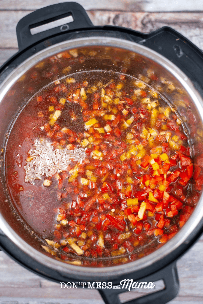 instant pot with water, beans and spices