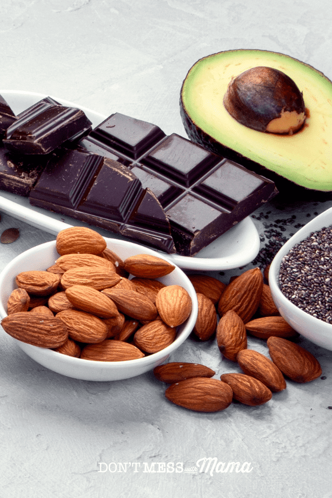 dark chocolate avocado and almonds on counter top