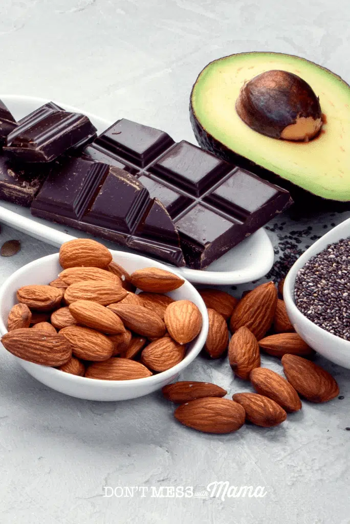 dark chocolate avocado and almonds on counter top