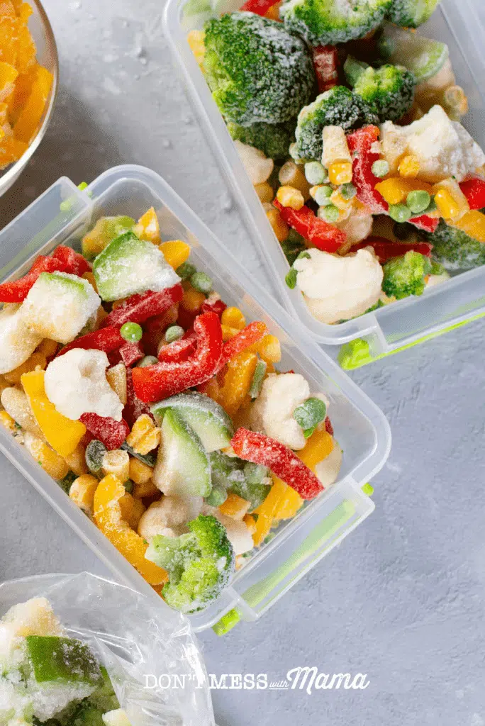 tupperware containers with frozen vegetables