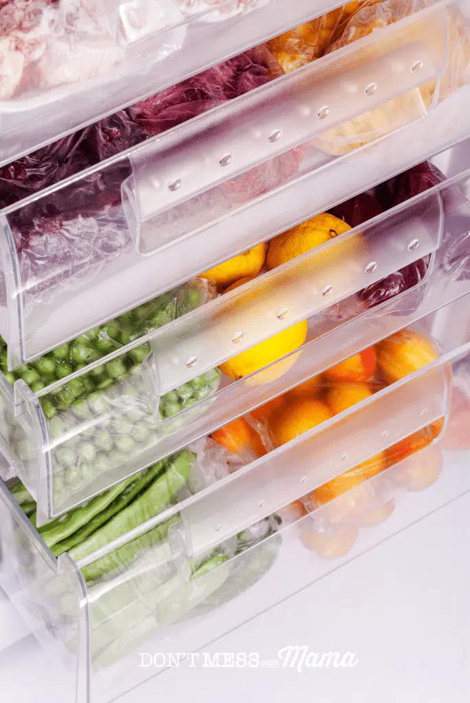 freezer drawers full of fruit and vegetables