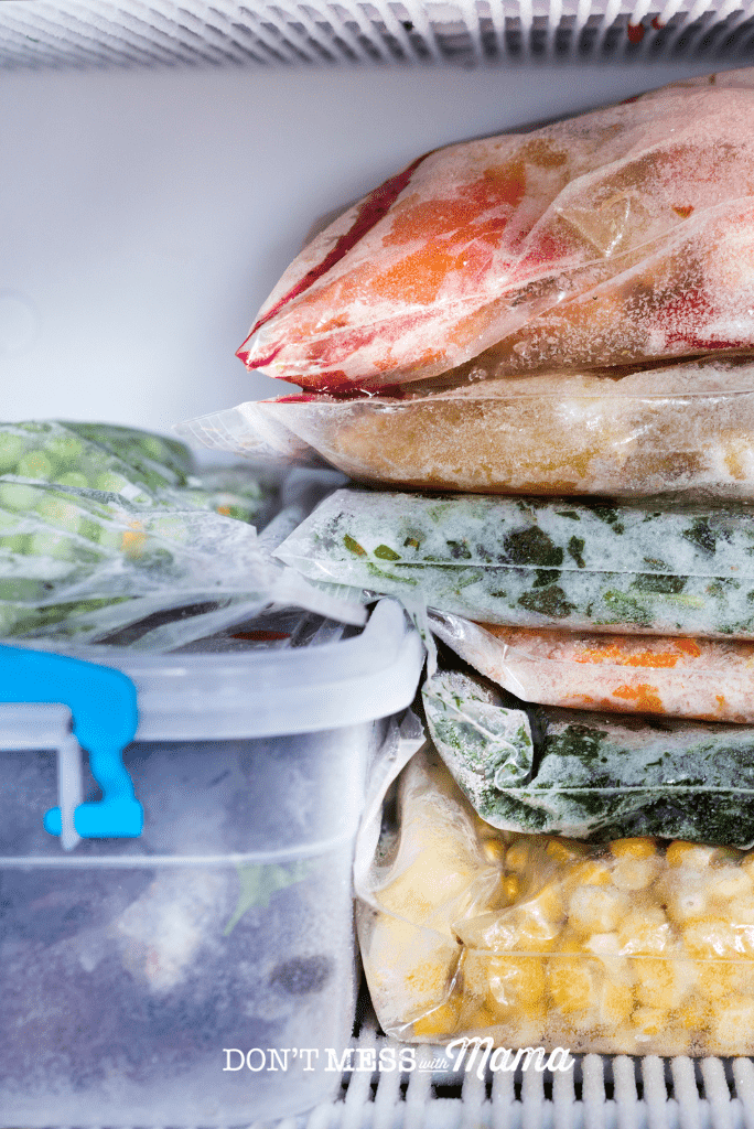 stack of frozen food in freezer bags
