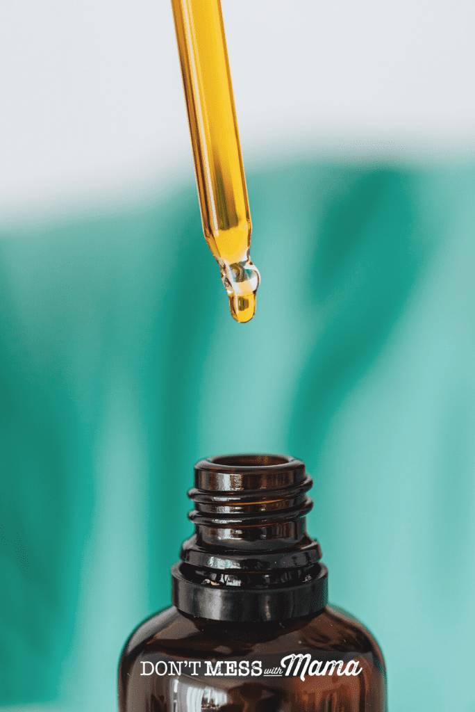 bottle of cod liver oil with dropper