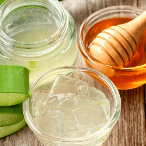 aloe vera gel and honey in small glass bowls