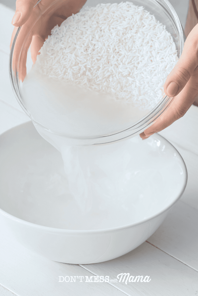 pouring out water from rice