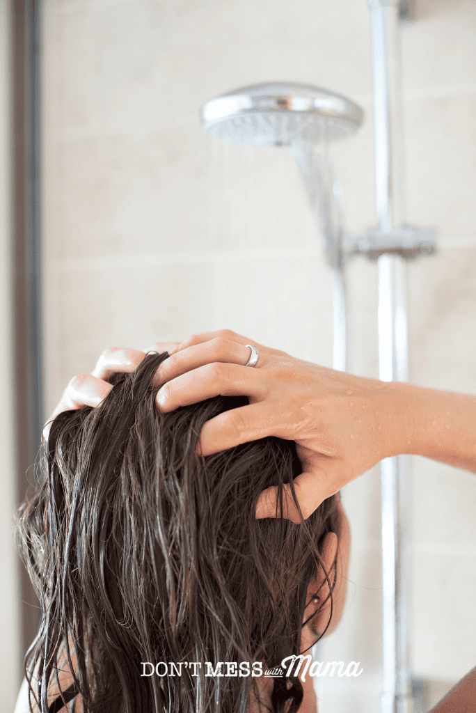 woman in shower washing hair